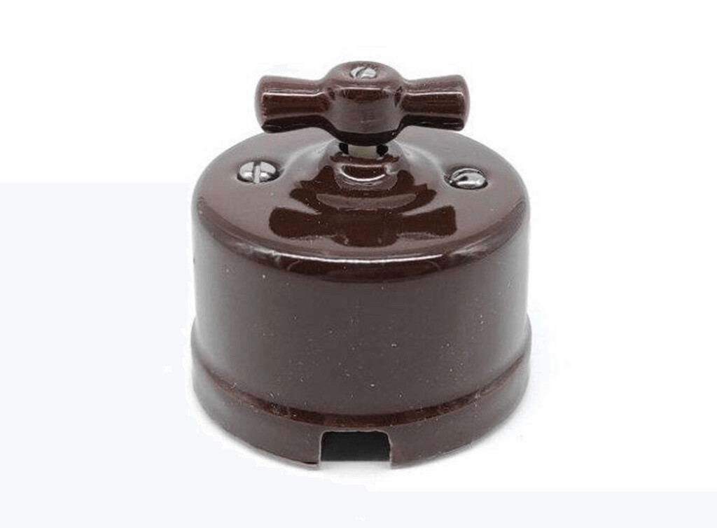 2902020-MA CONMUTADOR SUPERFICIE PORCELANA MARRON F-BRIGHT